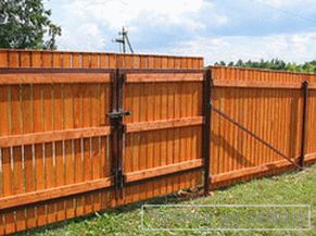 Wooden fence to give