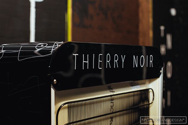 Thierry noir: graffiti on a two-door refrigerator